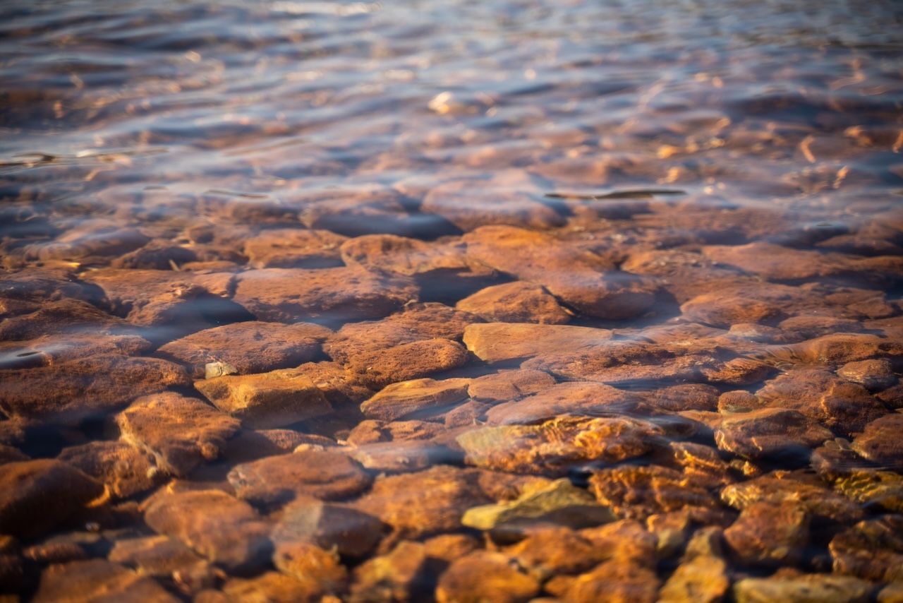 Discover how drainage stone supports French drains, retaining walls, and foundations by improving water flow in large landscaping and construction projects.